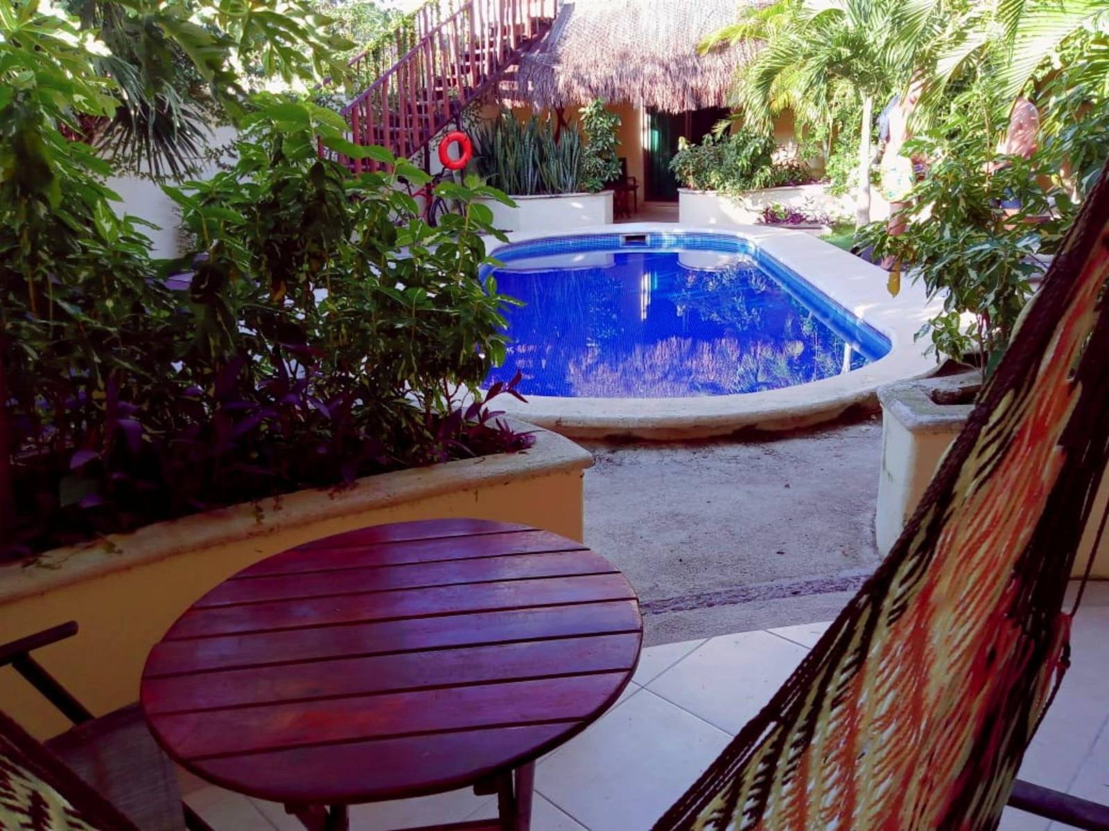 Villas Akalan: view of the pool from a ground-floor terrace